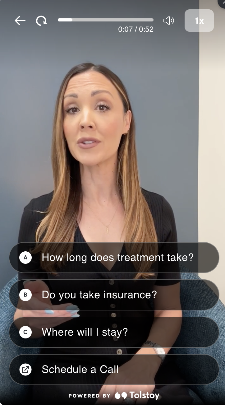 A brand representative from Lightfully Behavioral Health discusses treatment options in a video with AI prompts.